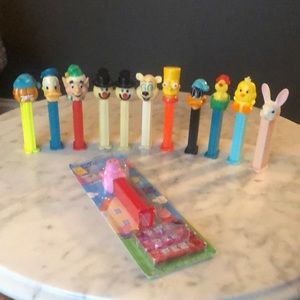 PEZ l Lot of 12 PEZ Vintage Pez Dispensers Simpson, Donald, Garfield, Snow Men…